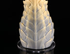 Detailed view of intricate scale patterns on dimvra-figurine mythical beast art figure.