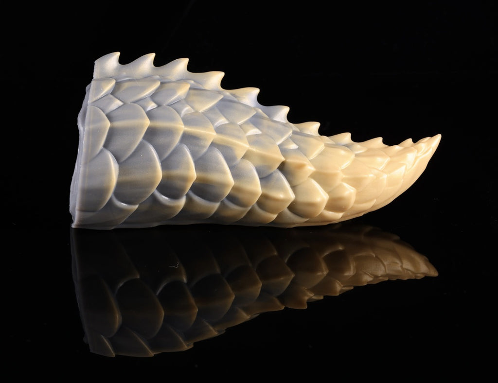 Top view looking down the length of the scaled dragon tail sculpture by dimvra-figurine.