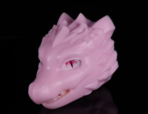 Three-quarter view of pink scalie fantasy creature figure with textured overlapping scales by dimvra-figurine.