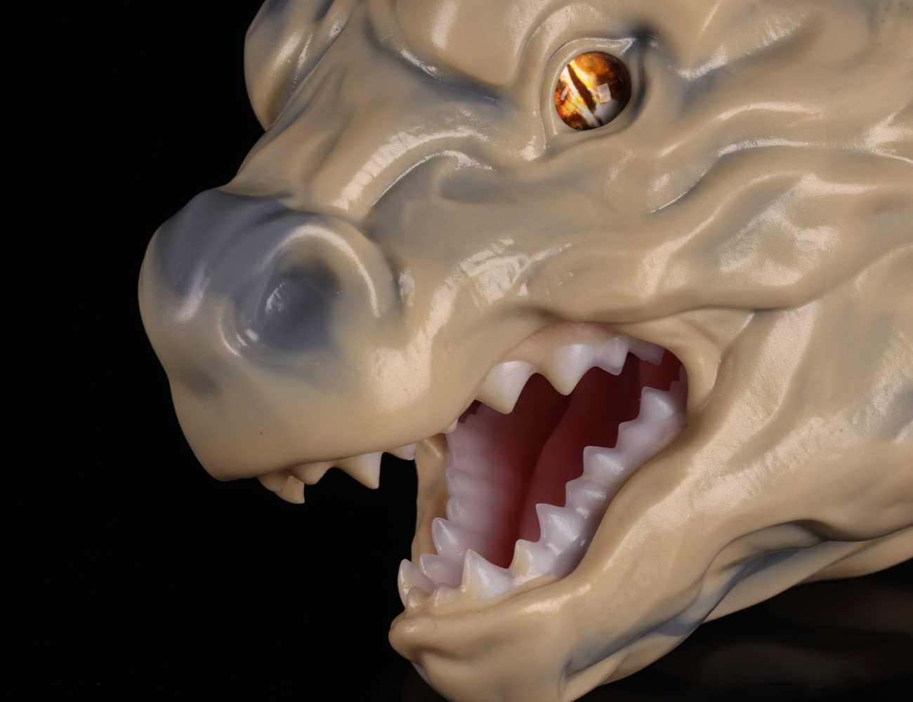 Deep throat and realistic teeth anatomy of the dimvra-figurine open-mouth earth dragon prop.
