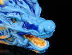 Detailed open mouth anatomy of the dimvra-figurine Dunhuang inspired Chinese dragon art figure.