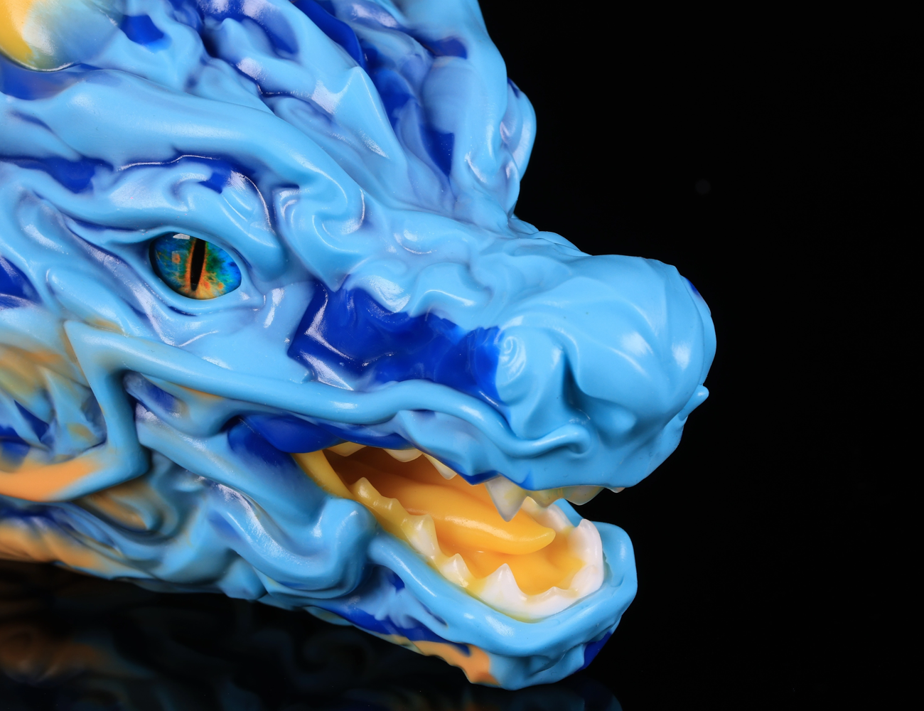 Detailed open mouth anatomy of the dimvra-figurine Dunhuang inspired Chinese dragon art figure.